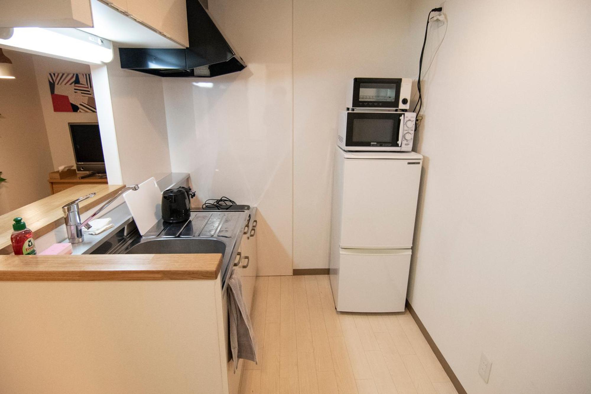 Tsubaki Garden Apartment Sapporo Ruang foto