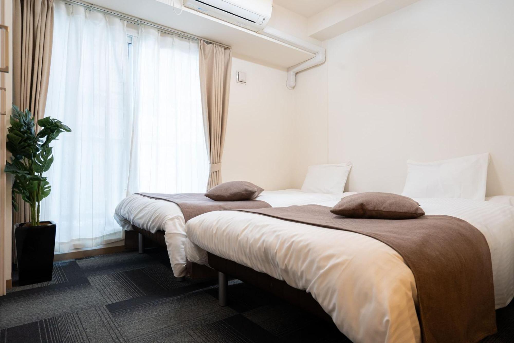 Tsubaki Garden Apartment Sapporo Ruang foto